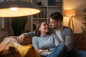 Couple having a heartfelt conversation in a cozy setting