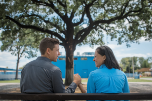 A stylish photo depicting a couple holding hands, symbolizing trust and connection in the digital age.